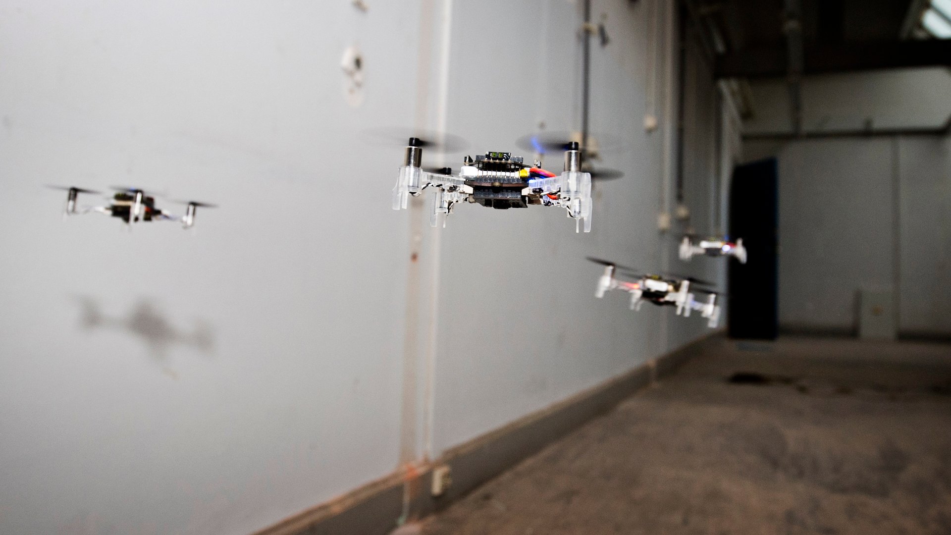 A drone swarm exploring an indoor space